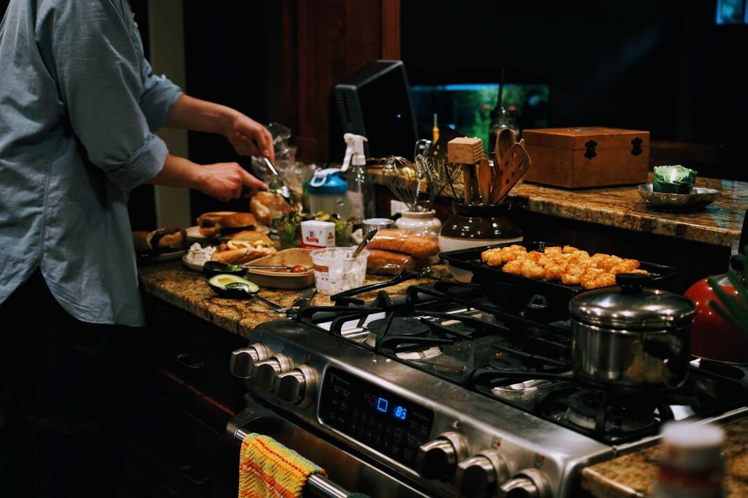 person arranging kitchen items